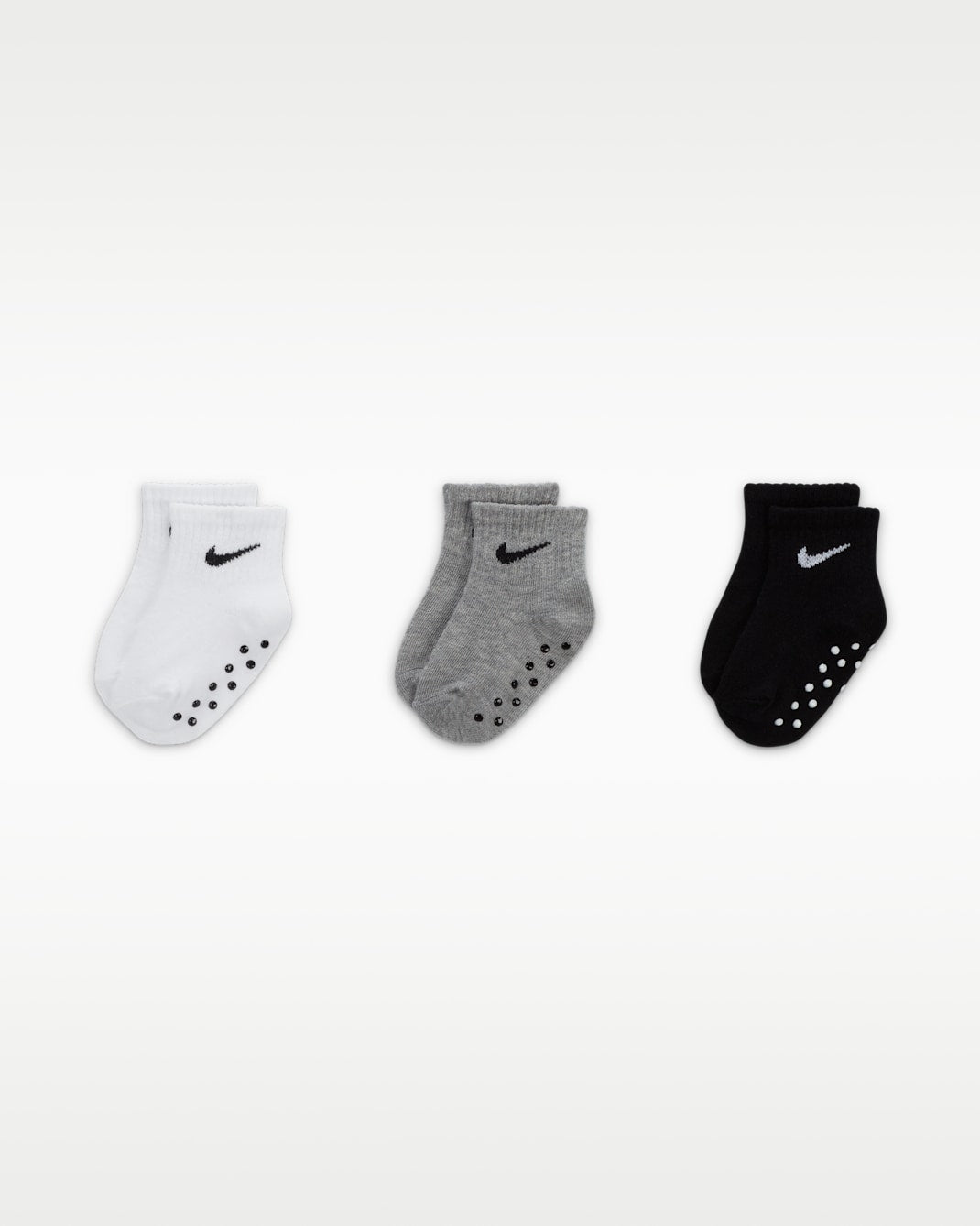 NIKE NIÑO MEDIA NHN CORE SWOOSH GRIPPER DK GREY HEATHER/BLACK