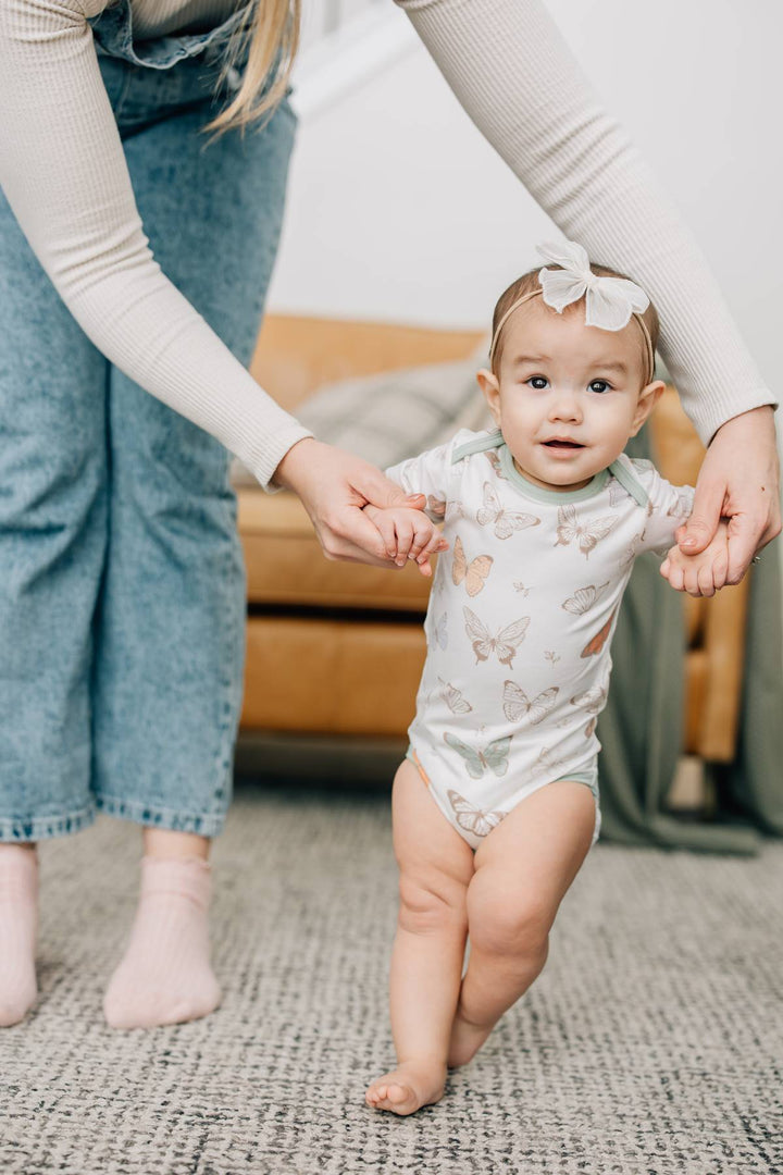 COPPER PEARL BEBE NIÑA BODY LUNA MANGA CORTA